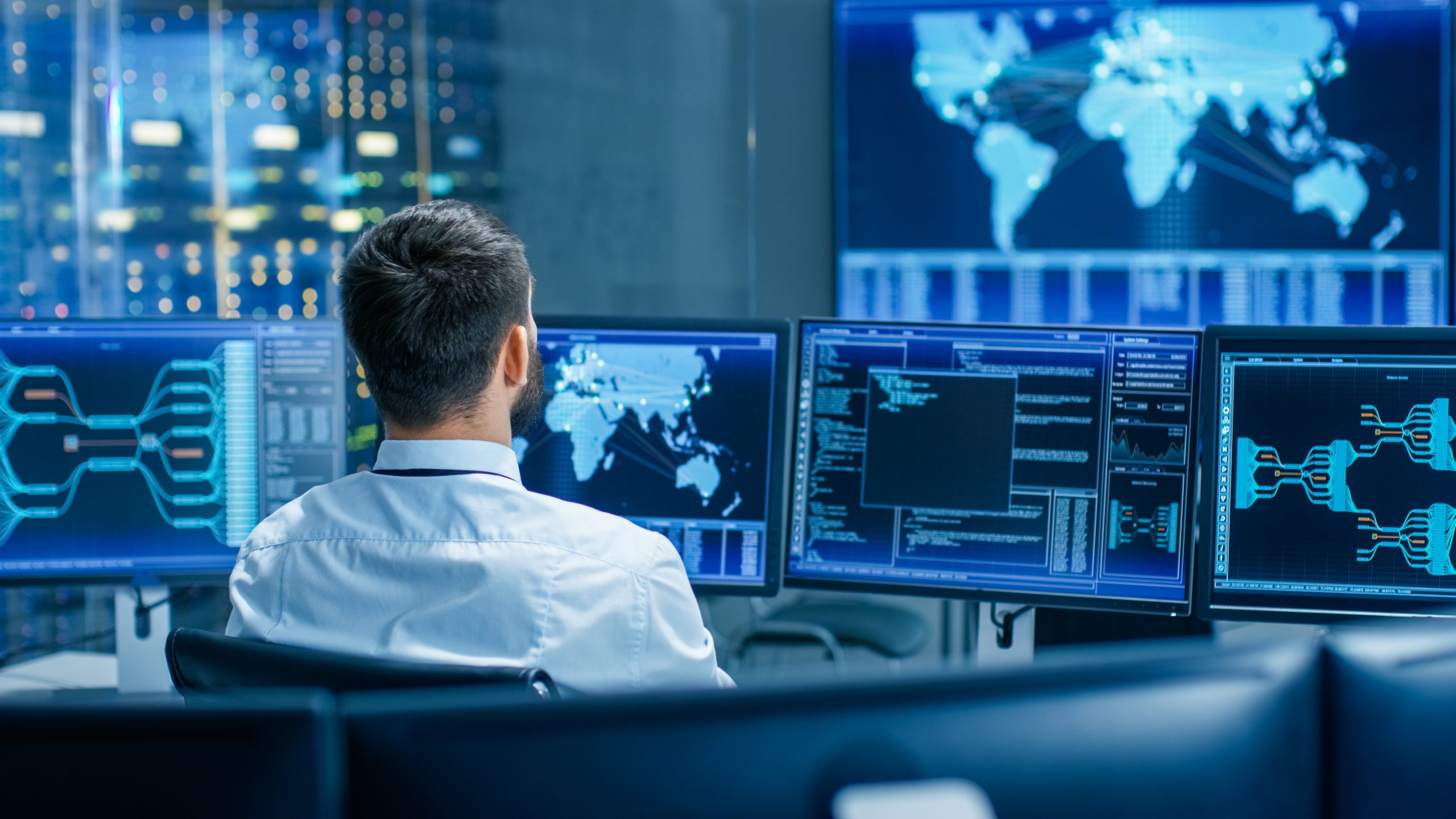 A man sitting in a security operation center