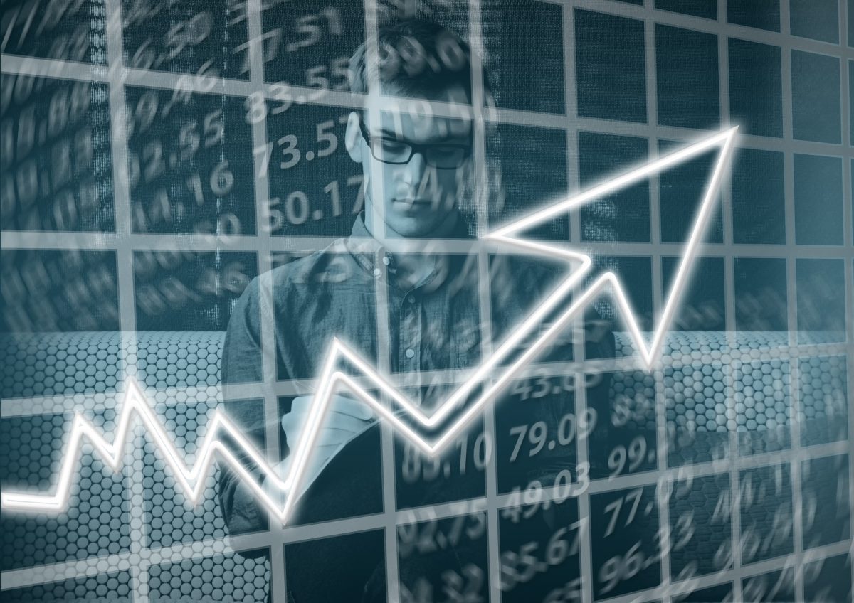 Analyst sitting behind a graph